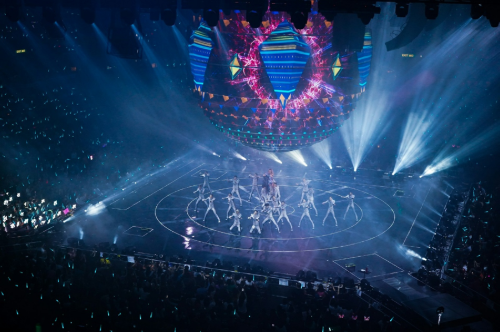 Crowded Eurovision concert arena with stage lighting and live performance, illustrating security, nightlife and mass-event safety concerns in major European cities including Vienna, Berlin and London.